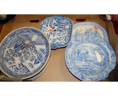 A box of 19th century blue and white china to include; Spode plates, blue and white drainers etc