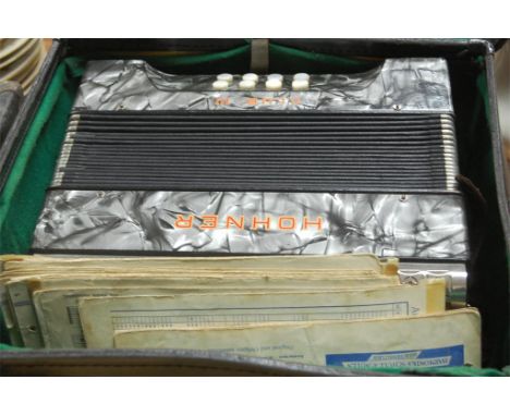 A Hohner Club 3 piano accordion, cased