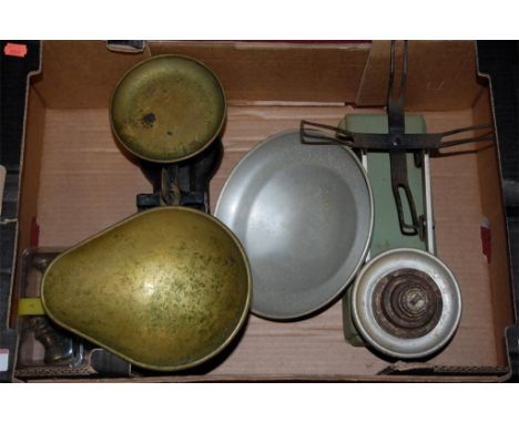 Two boxes of cast iron and other kitchen scales and weights 