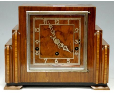 An Art Deco walnut cased mantel clock 