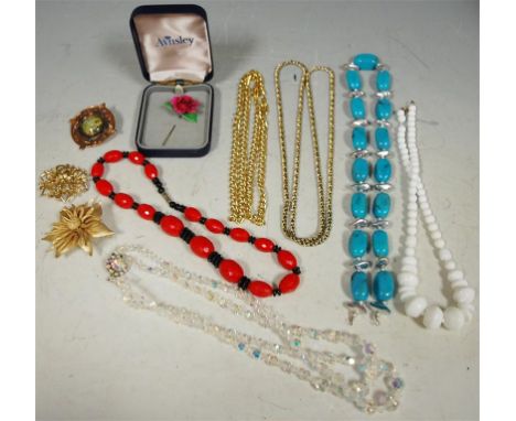 A small of assorted costume jewellery to include; beaded necklace, flower brooch, Aynsley porcelain stick-pin etc