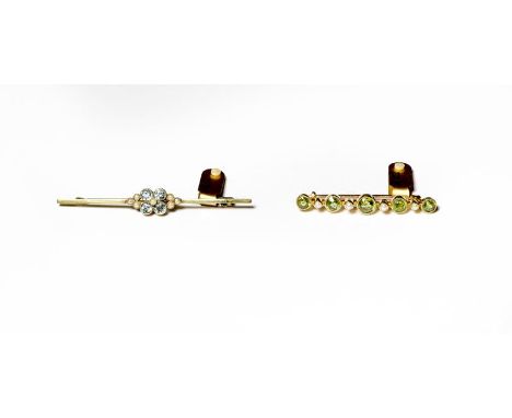 An aquamarine and split pearl bar brooch, length 5.8cm and a peridot and split pearl bar brooch, length 4.1cm .  Aquamarine b