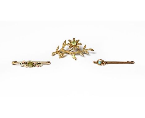 A peridot and split pearl brooch, the floral spray set throughout with two round cut peridots and split pearls, length 4.7cm 