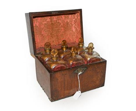 A 19th century mahogany cased set of six square decanters with stoppers, plus key.  Case with splits to the cover and veneer 