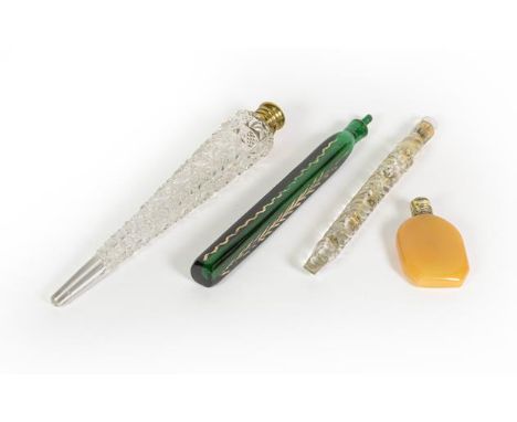 Two Glass Scent-Bottles and Two Brass-Mounted Glass Scent-Bottles, the first two each tapering, one of gilt decorated green g