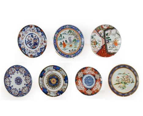 A selection of Japanese ceramic chargers, Royal Worcester 'To Celebrate The Millennium' plate, Capodimonte group of a man sit