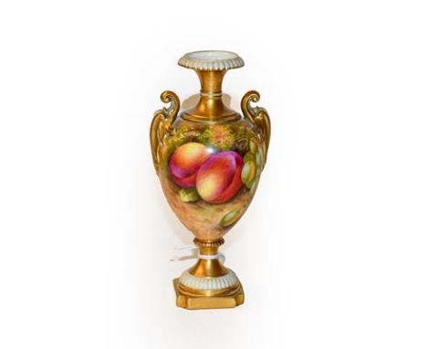 A Royal Worcester pedestal vase by Edward Townsend, with scrolling handles, painted with peaches and grapes, signed E. Townse