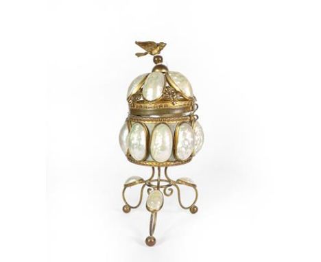 A Brass Mounted Shell Trinket Box, on three scroll feet, the hinged openwork cover with bird finial, 27cm high .  Two mother 