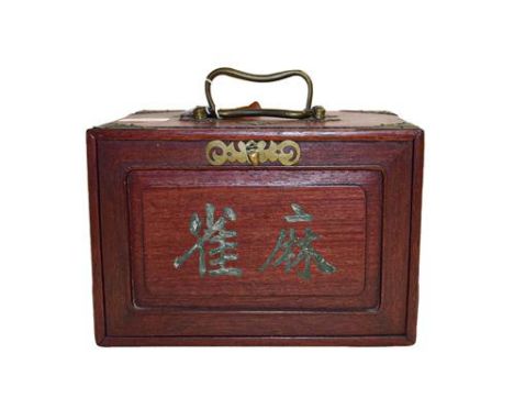 A cased bone Mahjong set.  Size of the box 24cm by 17cm by 17cm. The box a little tired, the back panel is loose, otherwise i