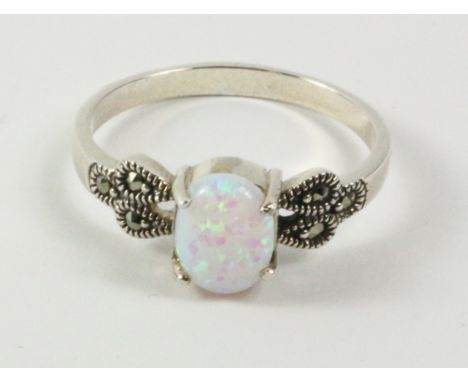 Opal and marcasite ring stamped 925   Condition Report   Click here for further images, condition, auction times & delivery c