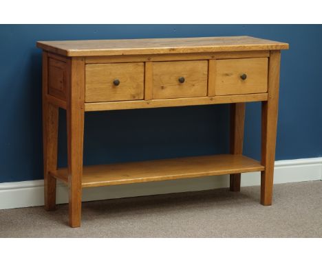 Light oak three drawer console table, W109cm, H78cm, D38cm   Condition Report   Click here for further images, condition, auc