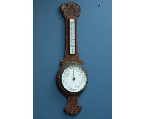 Early 20th century oak aneroid wheel barometer with thermometer H84cm & a similar Skule Art Deco walnut barometer H58cm (2)  