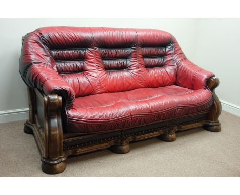 Oak framed three seat sofa upholstered in red leather, three drawers, W190cm   Condition Report   Click here for further imag