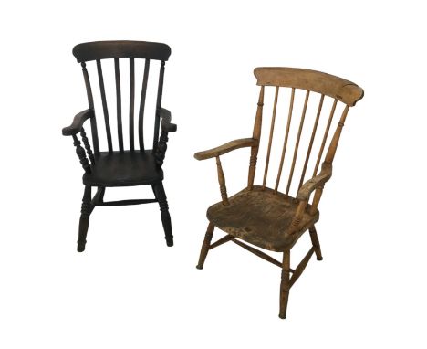 Two Windsor open armchairs, one with a slat back and the other with a stick back, both with shortened legs. (2) 