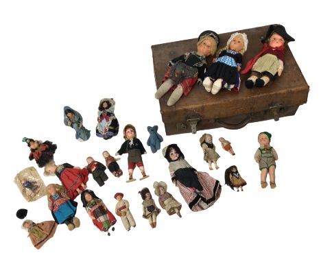 A group of early 20th century and later dolls, including a bisque headed doll with open mouth bearing a row of teeth, stamped