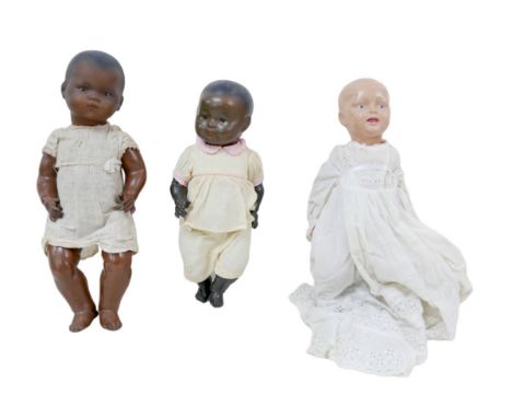 Three Early 20th century and later dolls, including an Armand Marseilles black bisque headed doll, with sleepy eyes, numbered