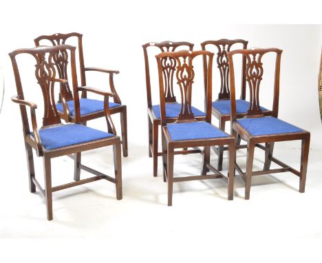 Set of six mahogany early 20th century Chippendale style dining chairs. Drop in deep blue velour padded seats, square upright