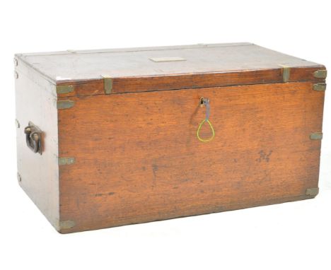 A 19th century Victorian oak campaign trunk chest. Rectangular form with wrought iron carry handles, brass mounts / fittings 