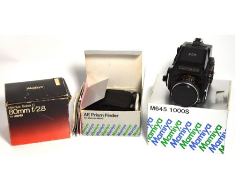 A medium format Mamiya 645 1000S roll film SLR camera complete with 80mm standard lens and AE prism finder complete with boxe