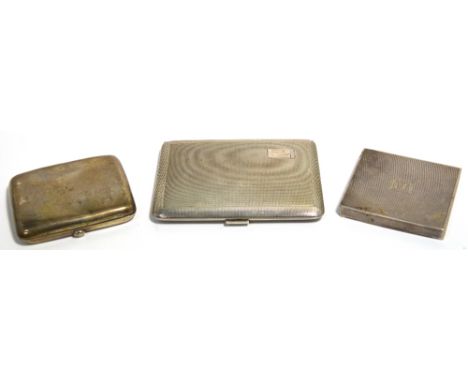 A George V hallmarked silver Goldsmiths & Silversmiths Co engine turned cigarette case, Birmingham 1922, a smaller George V h