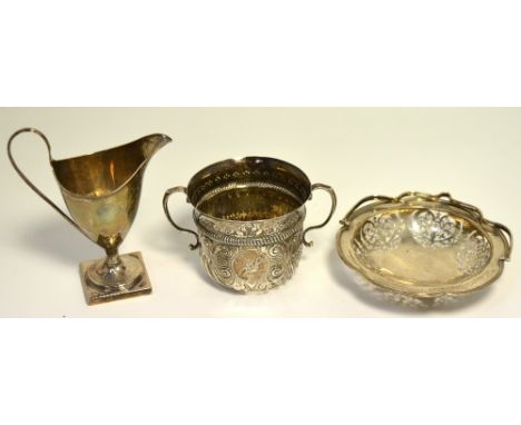 A Victorian hallmarked silver porringer, Birmingham 1896, a George V hallmarked silver basket, Sheffield 1922 and a George IV