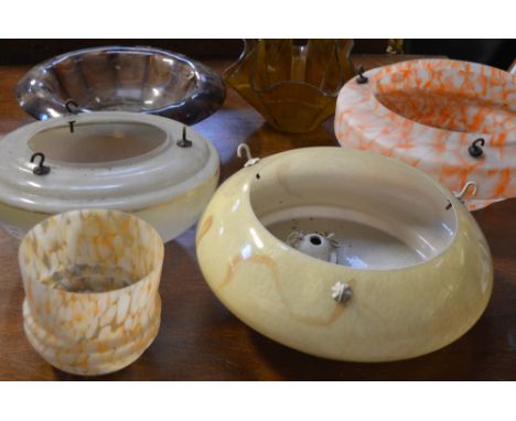 Four Art Deco style light shades to include two marble effect examples and two Art Deco style glass vases to include a handke