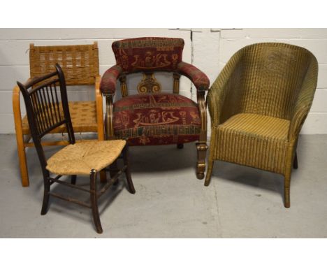 Four chairs to include a mahogany low chair with rush seat, a Lloyd Loom style chair, a low chair with rush seat and a Victor