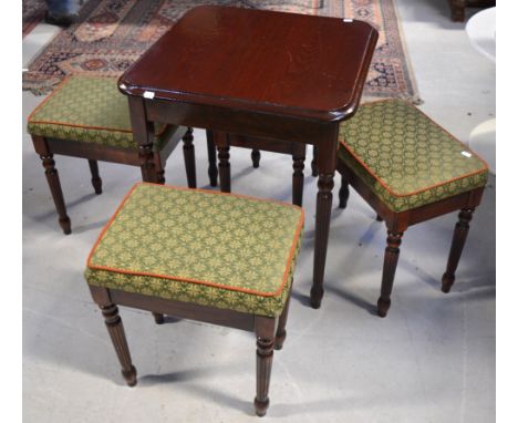 A 20th century small mahogany square side table on fluted legs, 60 x 60cm with four small mahogany stools upholstered with fa