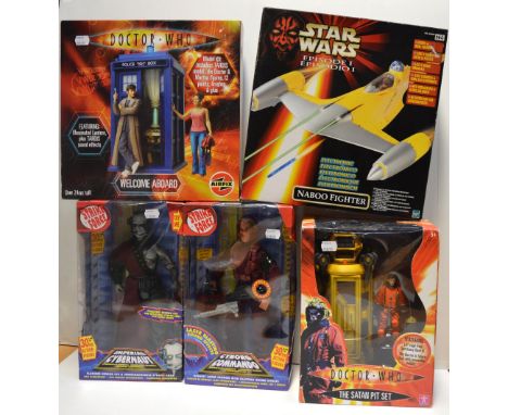 Two boxed Doctor Who figure sets, "The Satan Pit" and "Welcome Aboard", two boxed Strike Force figurines, "Cyborg Commando" a