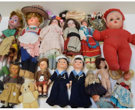 A collection of vintage dolls to include a string puppet of Gretel, c.1960s baby doll, various costume dolls to include Sailo