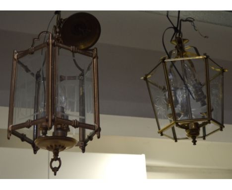 Two reproduction interior ceiling lanterns in brass and gilded metal, each with a three light fitting (2). CONDITION REPORT O