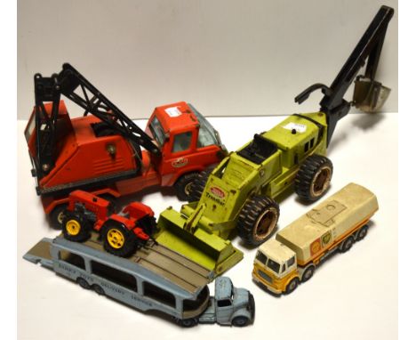 A Dinky model Bedford car transporter model 482, an Octopus petrol tanker, a Corgi forklift truck in Eddie Stobart colours, a