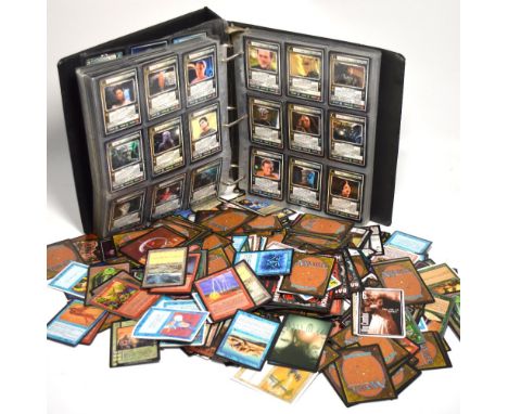 An album of Star Trek collectors cards and a collection of Deckmaster magic cards. CONDITION REPORT All Star Trek cards.