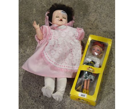 A boxed Pelham puppet "Mitzi" and a walking doll (2).
