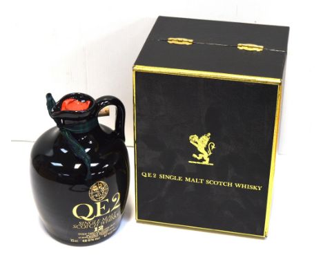 A boxed ceramic bottle of QEII single malt twelve year old Scotch whiskey and a quantity of Concord memorabilia. *Purchased b