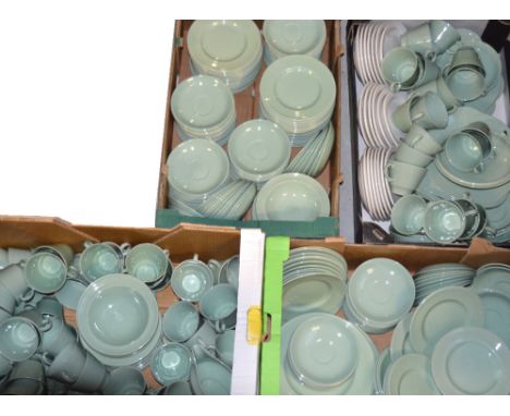 A very large quantity of green ground Woods ware tea and dinnerware, mainly cups and saucers.