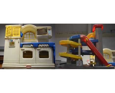 A large quantity of toys for the younger child to include two large pay kitchen manufactured by Little Tikes and the Early le