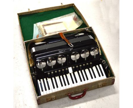 A cased Scandalli piano accordion. 