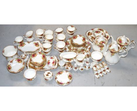 A quantity of Royal Albert "Old Country Roses" pattern teaware to include teapots, cups, saucers, a sandwich plate, a gravy b