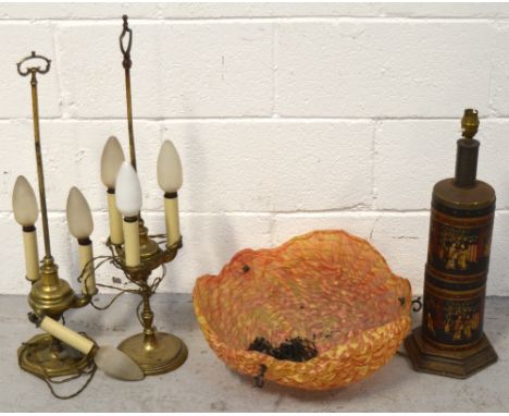 Four lamps to include two early 20th century brass lamps, an Oriental style metal lamp and an Art Deco shell shaped glass cei