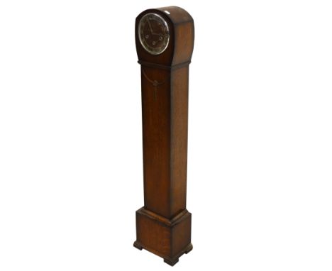 An early 20th century oak cased thirty hour grandmother clock, dial set with silvered Arabic numerals, height 132cm.
