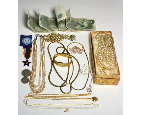 A small quantity of costume jewellery to include a Regency cased ladies wristwatch, a yellow metal and blue enamel medal awar