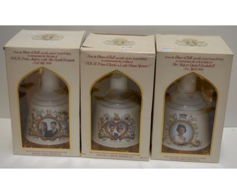 Three boxed commemorative Wade Bell's scotch whisky decanters, one commemorating the Queen's 60th Birthday, one commemorating