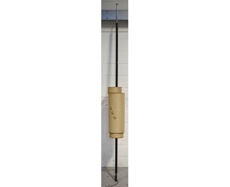 A retro 1960s floor to ceiling lamp.