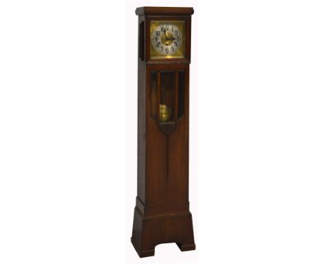 A 20th century oak grandmother clock, metal dial set with Arabic numerals, height 70cm.