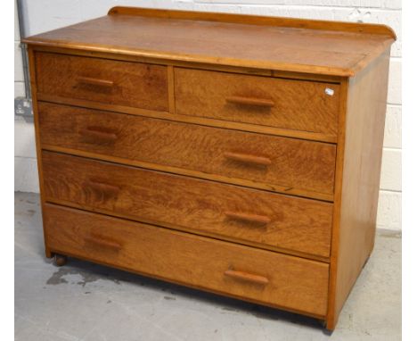 A retro light oak two over three chest of drawers on castors, width 126cm.