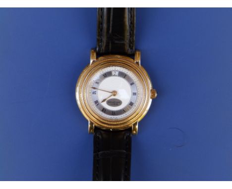 A gent's 18ct gold Parmigiani Fleurier Automatic wrist watch, the engine turned silver dial with GMT window at 12 position,  