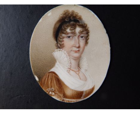 Charles Hayter - An early 19thC oval watercolour miniature - Portrait of a lady in high lace collar, unsigned, 2.5" high, in 