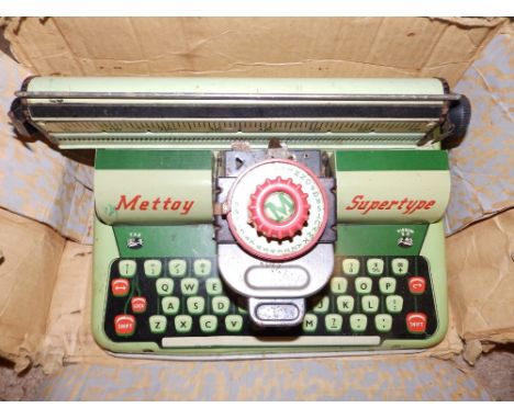 A Mettoy 'Supertype' tinplate typewriter and a boxed Subbuteo set - 'Continental Display Edition' - two players damaged.