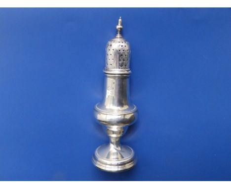 A Georgian silver caster - London 1784, 6.1".